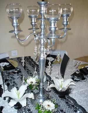 candelabra with candles and beads